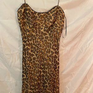 Fun, silky, and chiffon leopard print overly dress